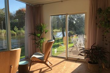 Amsterdam  Außergewöhnlich Vergader- en coachruimte in het groen in Amsterdam image 1